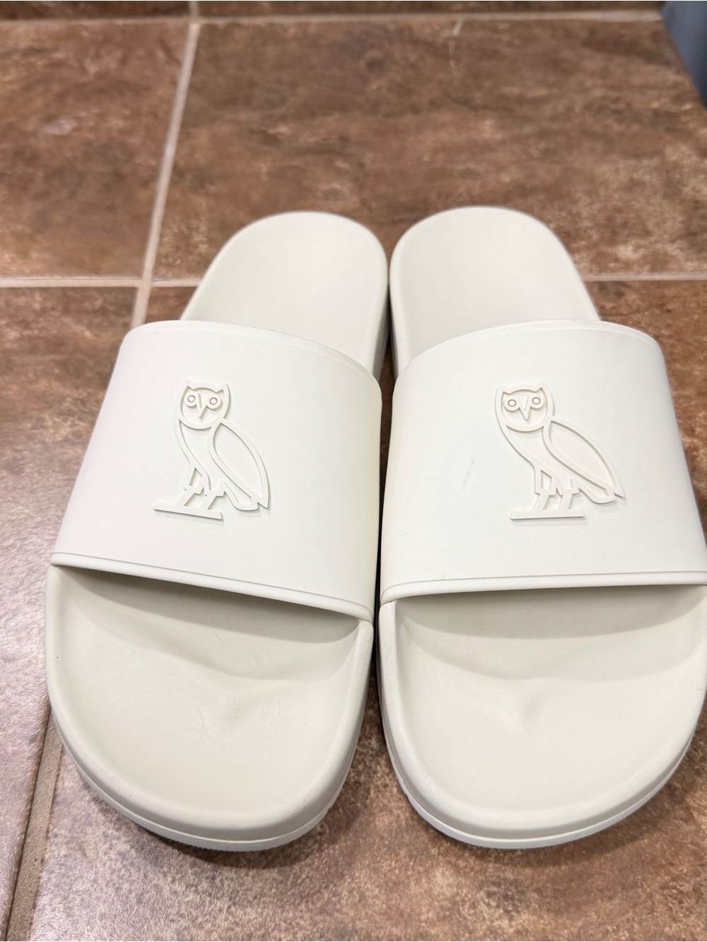 October’s very own Drake’s brand OVO
Slide Sandals in Off-White.